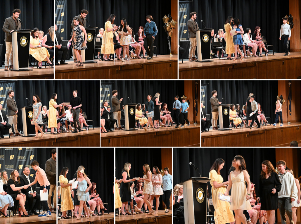 students receiving awards on stage